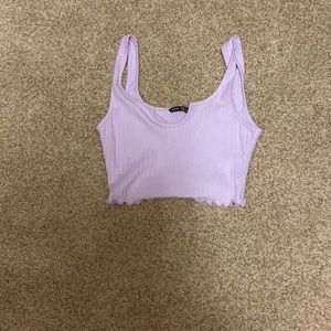 Selling a cute lavender crop top size extra small. Very comfortable, breathable!